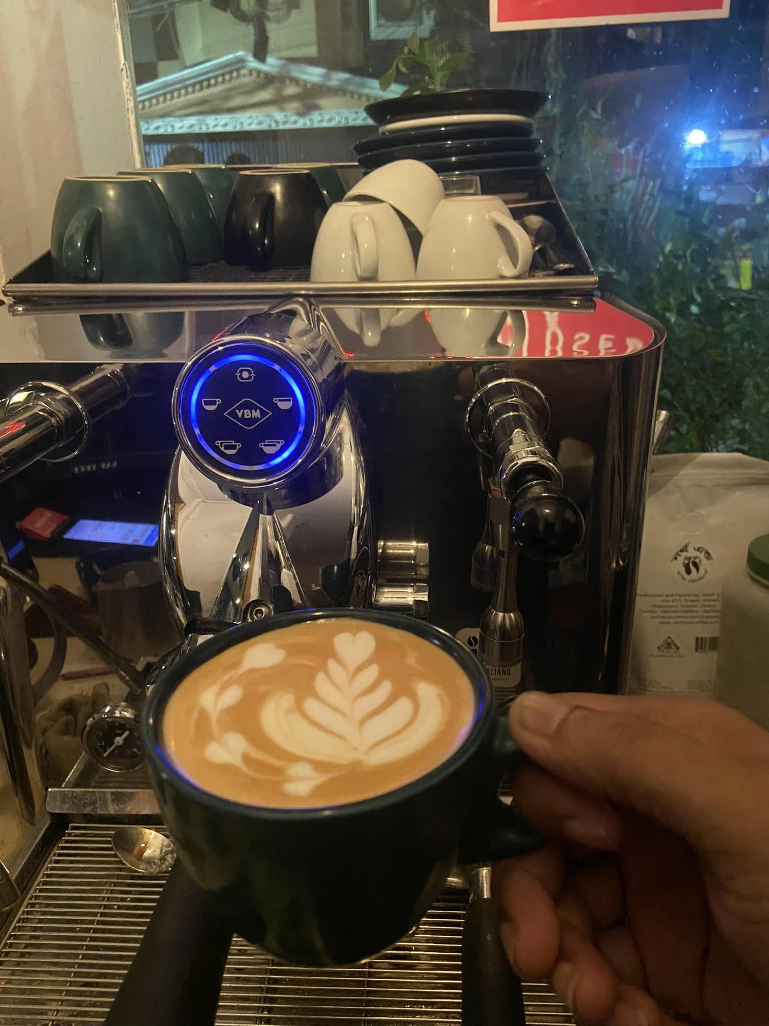 Advance coffee machine in the background